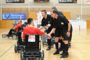 axiwi-communication-system-referees-european-powerchair-football-association-handshake-players