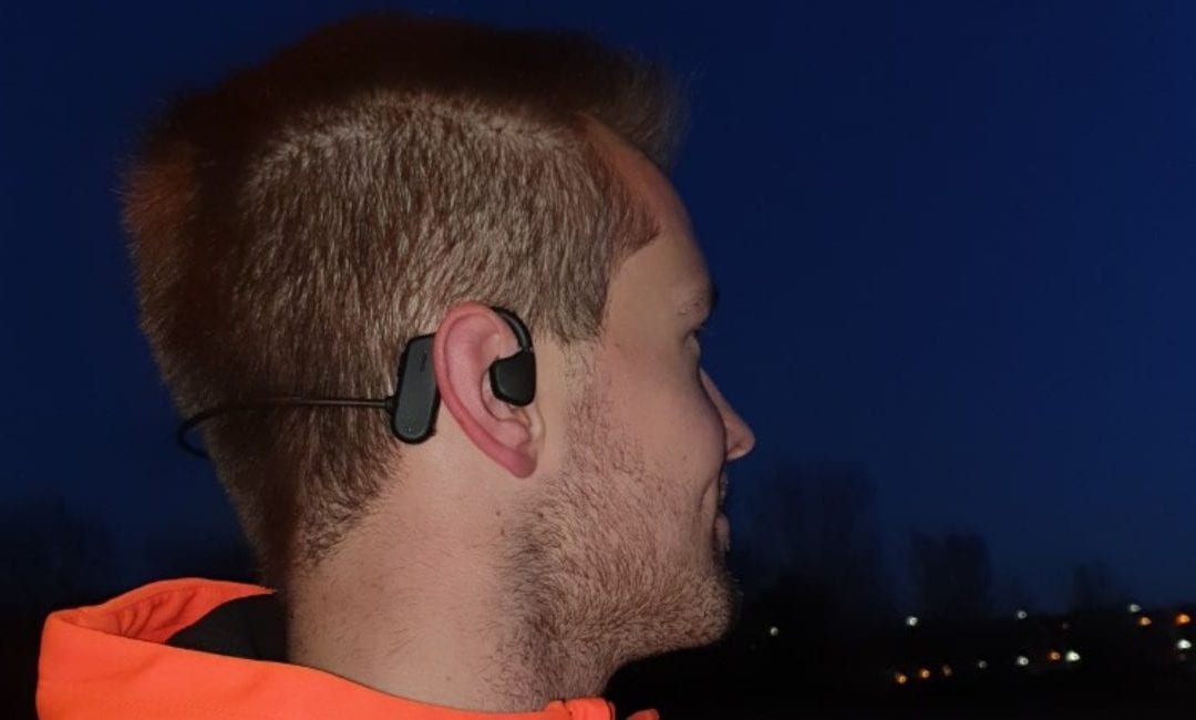 Glenn Siebens using the AXIWI bluetooth sport headset in the gym and while walking