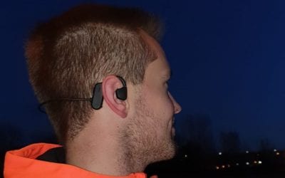 Glenn Siebens using the AXIWI bluetooth sport headset in the gym and while walking